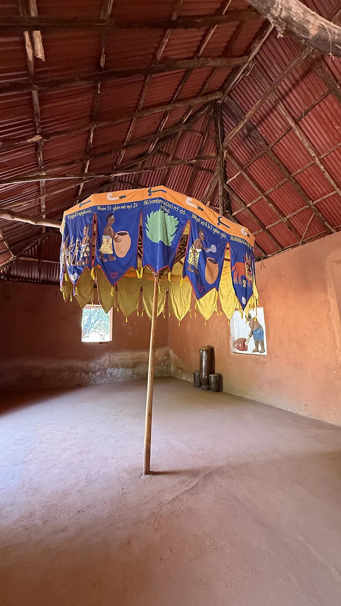 Embroidered royal parasol in an Abomey house