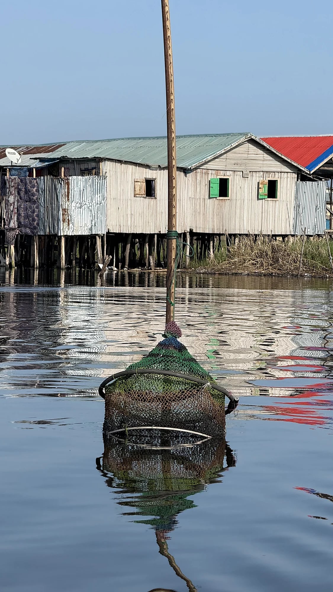 Fishing trap and colourful houses in Ganvié