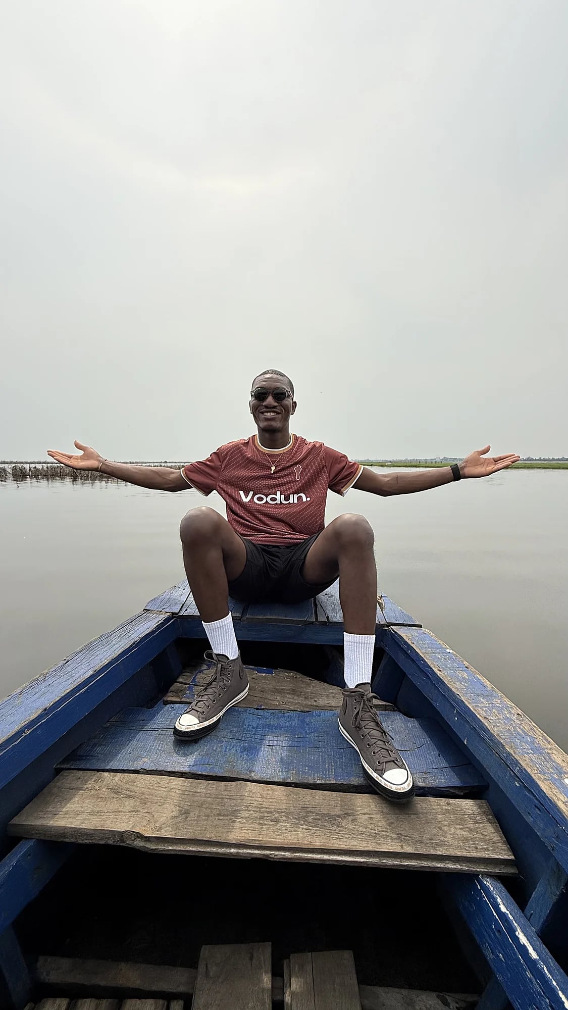 Traveller in a canoe on Lake Nokoué